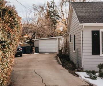 Suburban home with driveway and a garage.