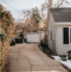 Suburban home with driveway and a garage.