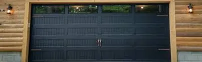 An image of a black garage door   